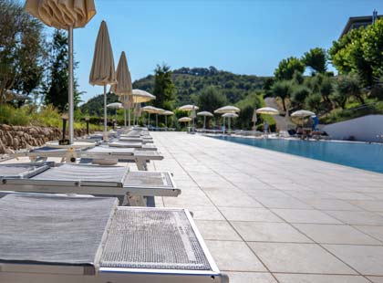 Swimming pool and deck chairs